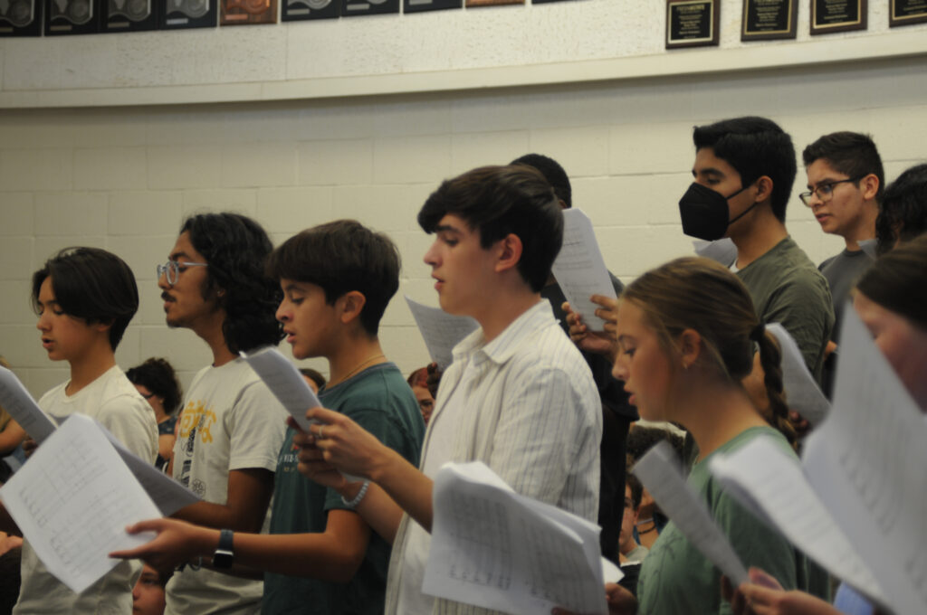 These students were preparing for the choir concert. They all seem really passionate about what they are doing.