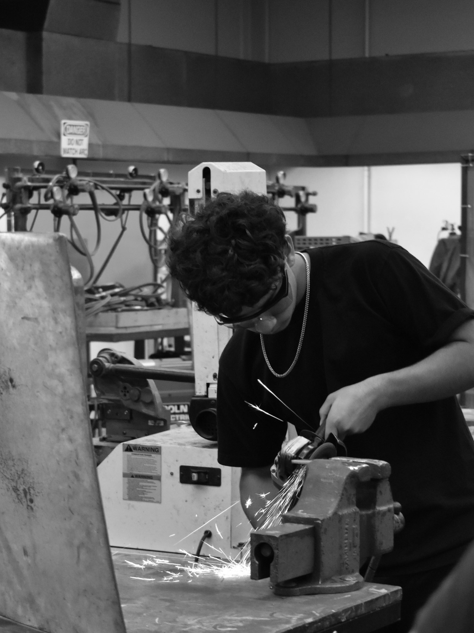 This boy is very focused on making sure his metal was being grinned correctly. No fear was shown despite the sparks shooting at his face. This photo was shot with a D3500 camera and a zoom lens. 