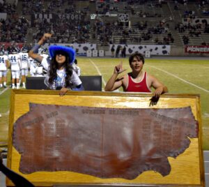 Cowhide game, bringing around the hide.