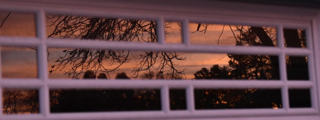 Reflection of the sunset in a window