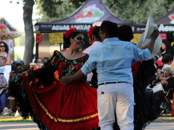 Photographed during a Selma celebration, Dia De Los Muertos. People danced together and looked together with care.