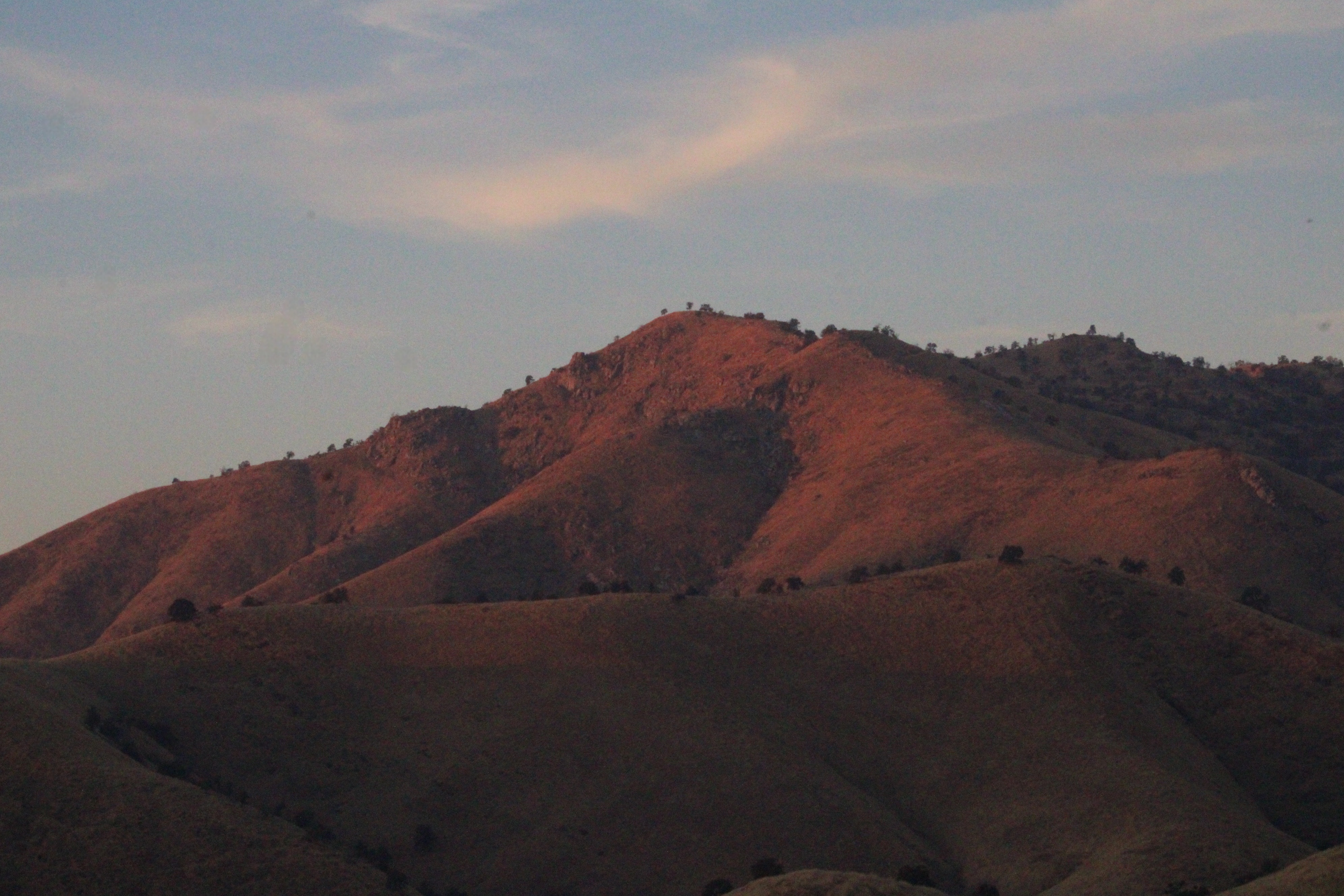 The Sun Setting, Pink Mountains