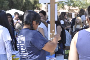 Students spend their lunch looking at all the interesting clubs Redwood’s campus has to offer at Club Day 2024